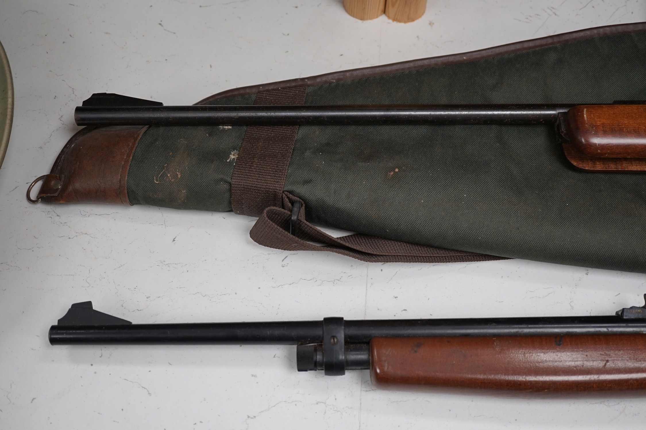 A BSA air rifle together with another
